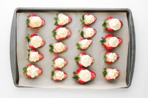 Deviled Strawberries topped with honey-sweetened graham cracker crumbs.