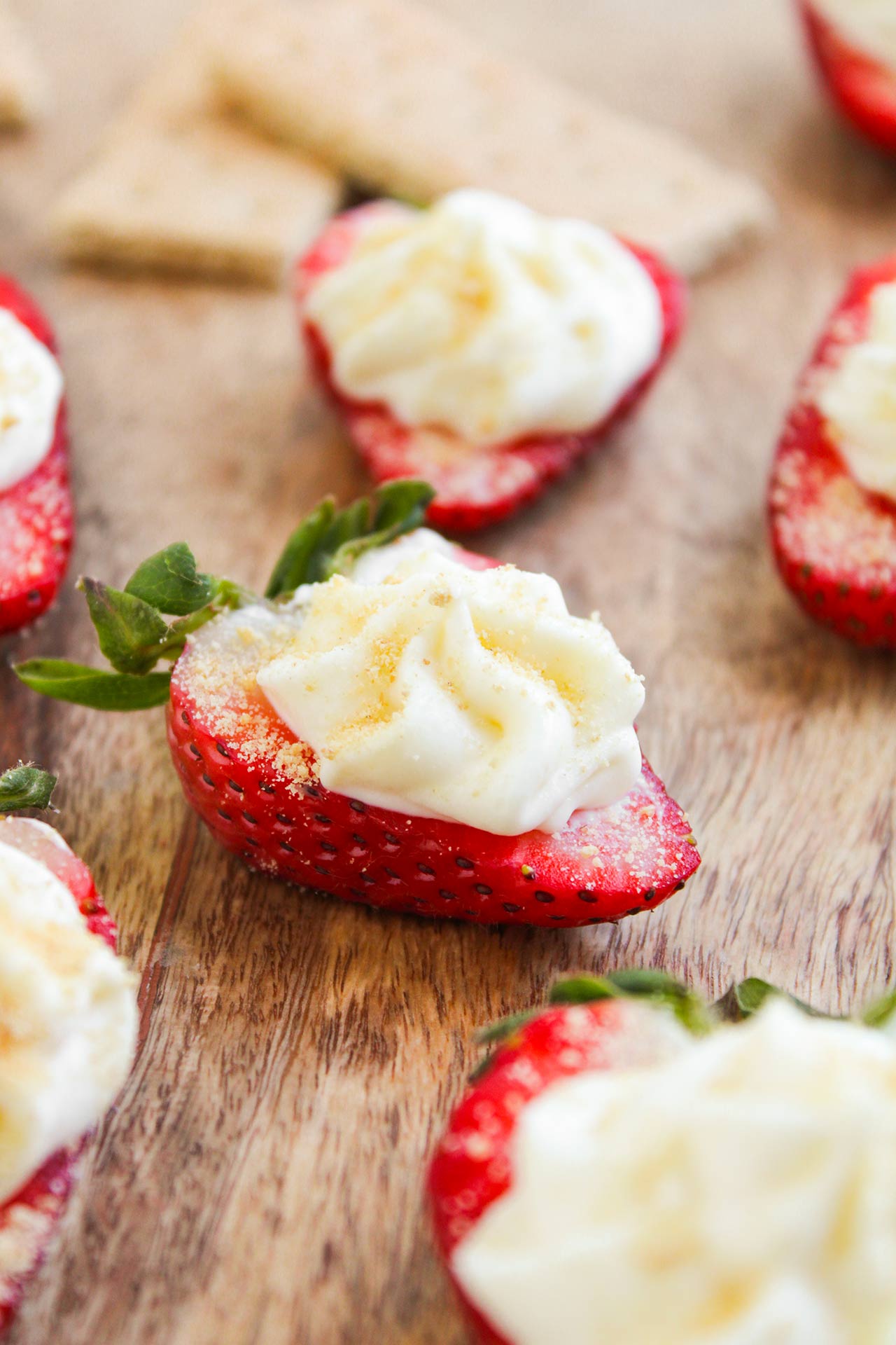 Deviled Strawberries on a cutting board.