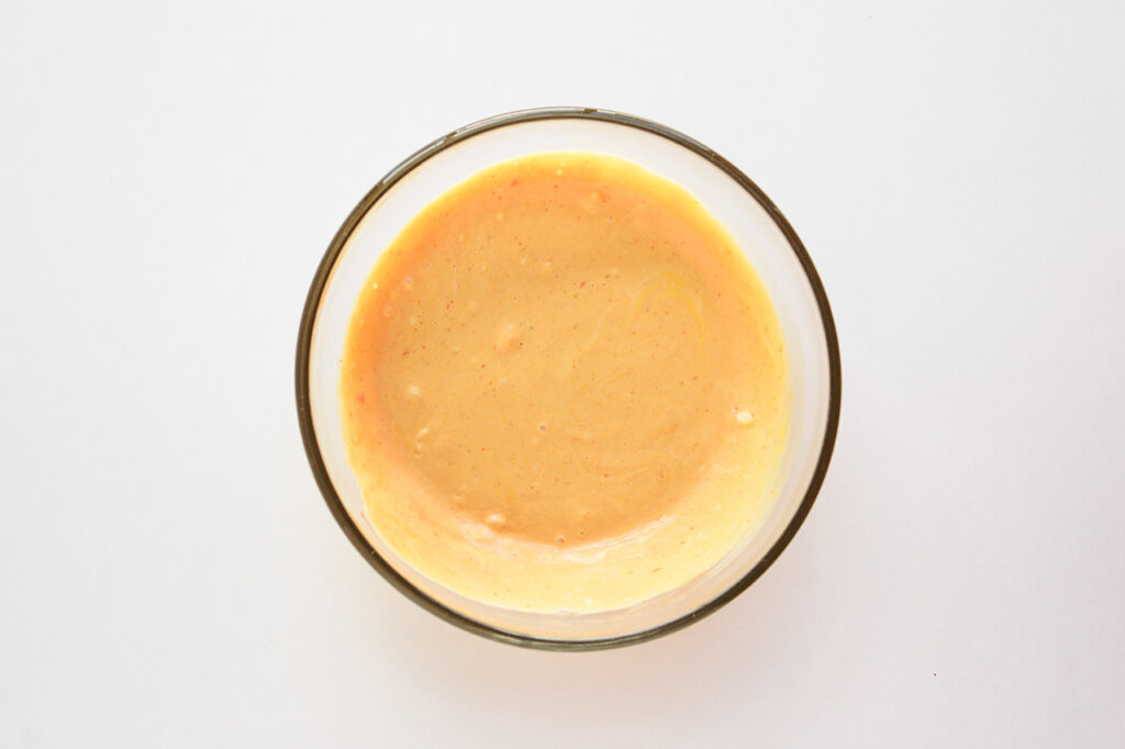 Mixed burger sauce in a glass bowl.