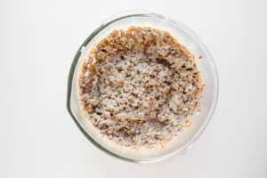 Cooked, ground meat stirred into whipped cream cheese.