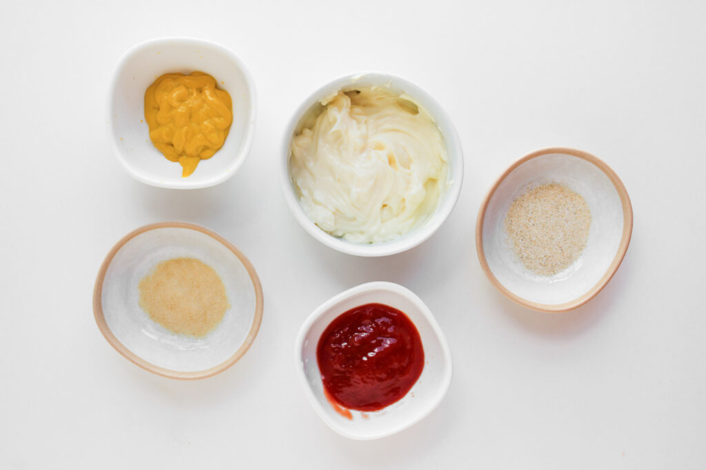 Sauce ingredients on a white surface.