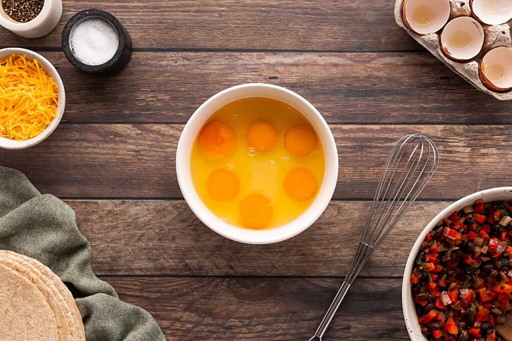 Eggs broken into a bowl.