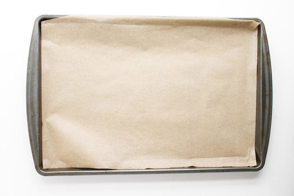 A parchment-lined baking sheet.