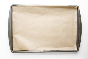 A parchment-lined baking sheet.
