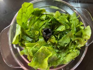 Spinach added to the blender.