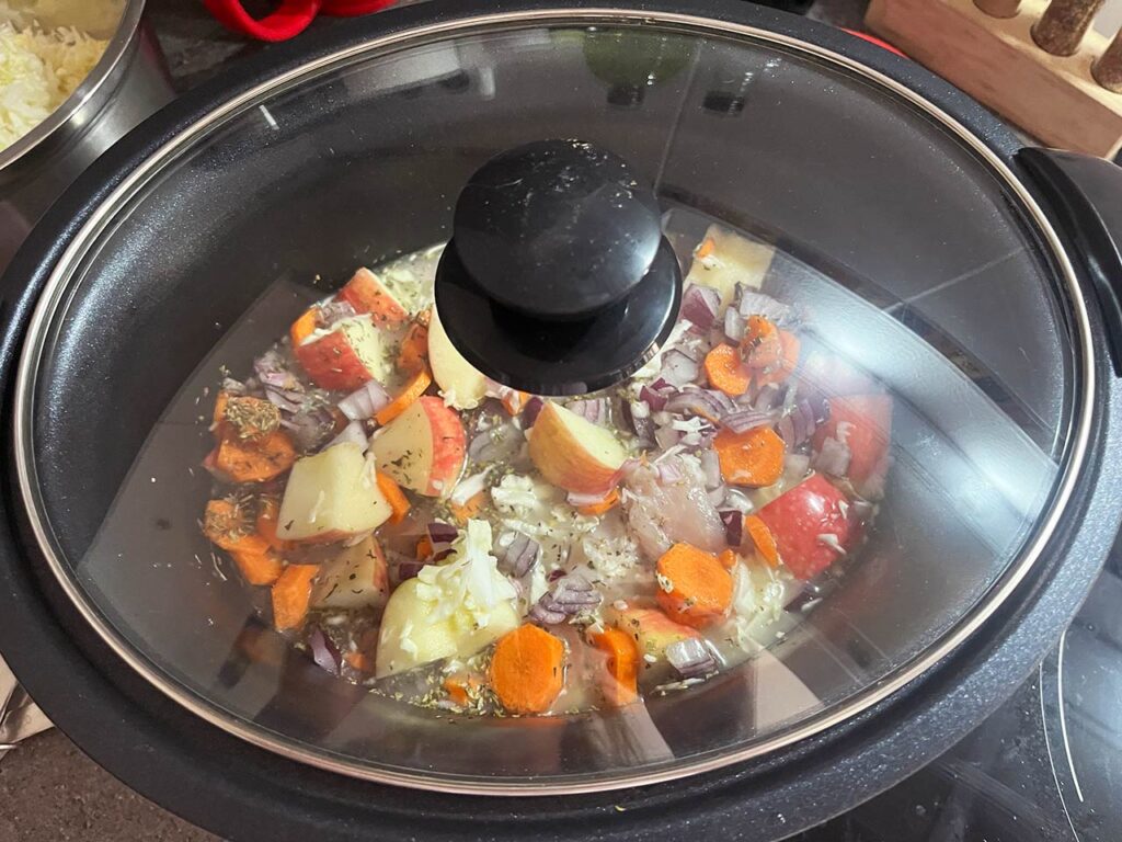 Lid placed on the slow cooker.