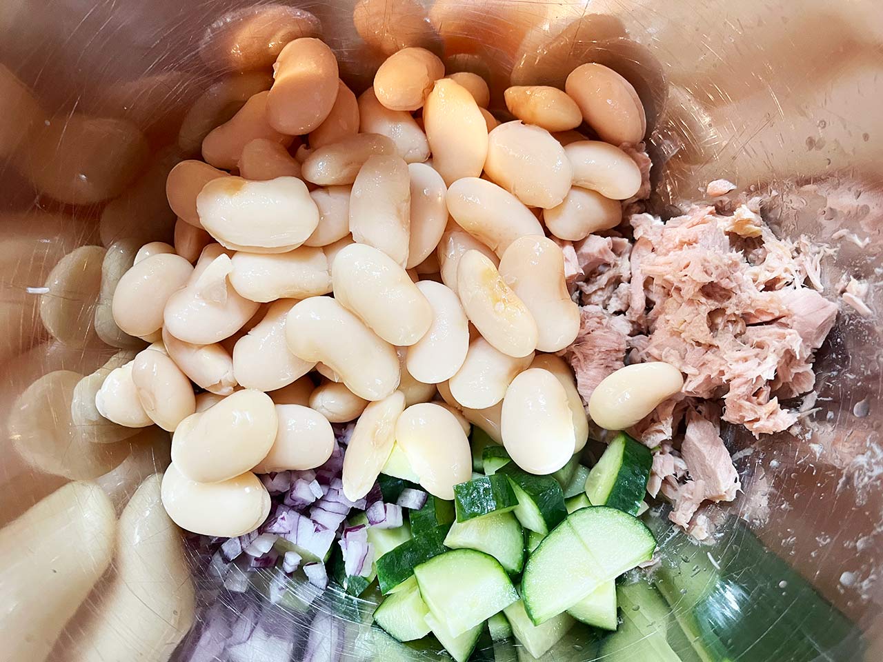 White Bean Salad With Tuna ingredients, unmixed, in a metal mixing bowl.