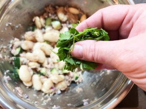 Adding fresh parsley to this White Bean Salad With Tuna.