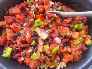 Mixing the ingredients in a slow cooker crock.