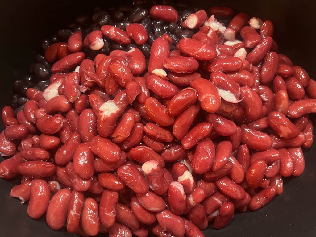 Kidney beans added to a slow cooker crockc.