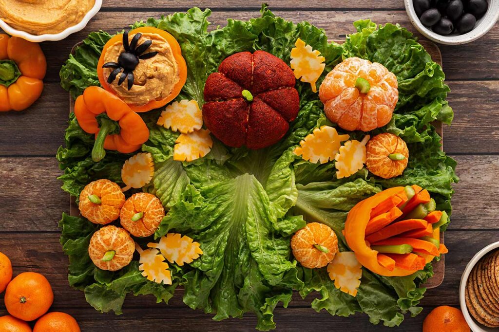 Leaf-shaped cheese slices laid around the board.
