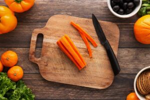 Slivers of carrot removed so you get pumpkins when you slice the carrot.