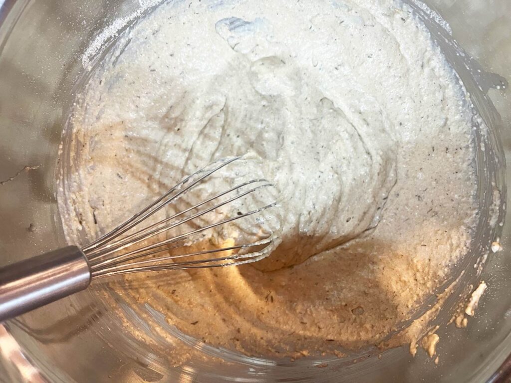 Wet ingredients added to the topping's dry ingredients and whisked together.