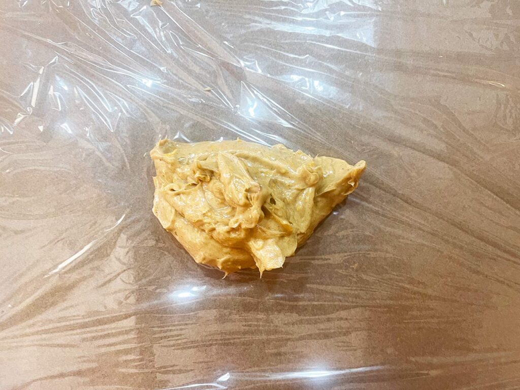 Soft Compound Butter on a sheet of plastic wrap.