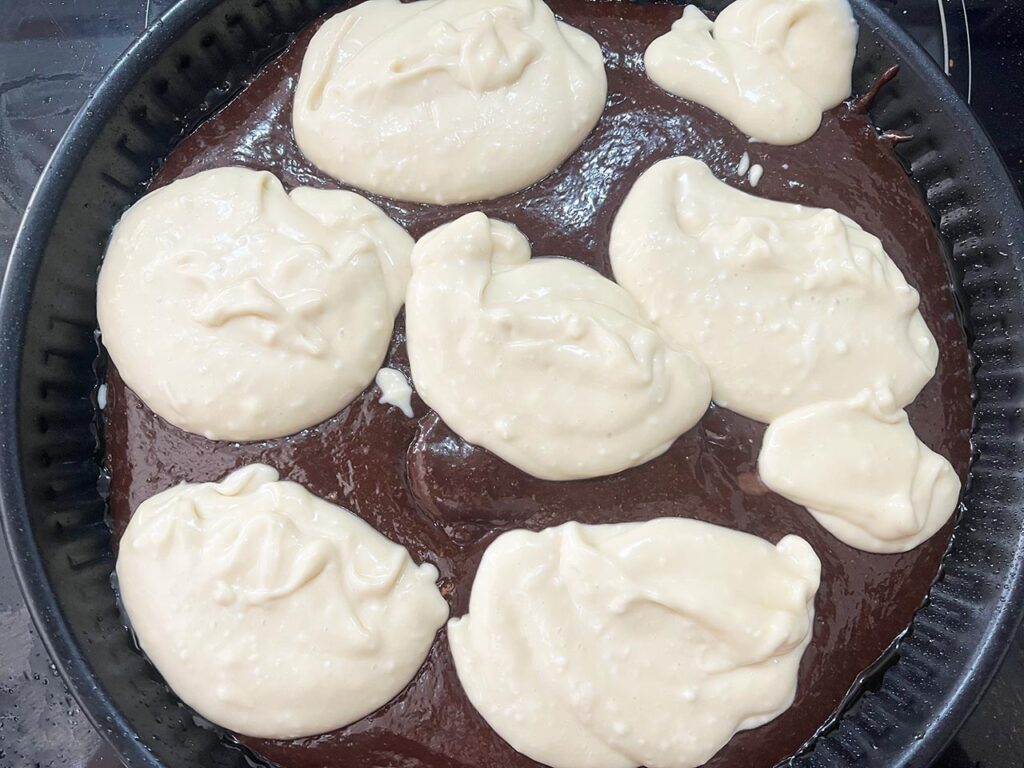 The cream cheese added over the top of the brownie batter in dollops.
