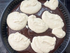 The cream cheese added over the top of the brownie batter in dollops.