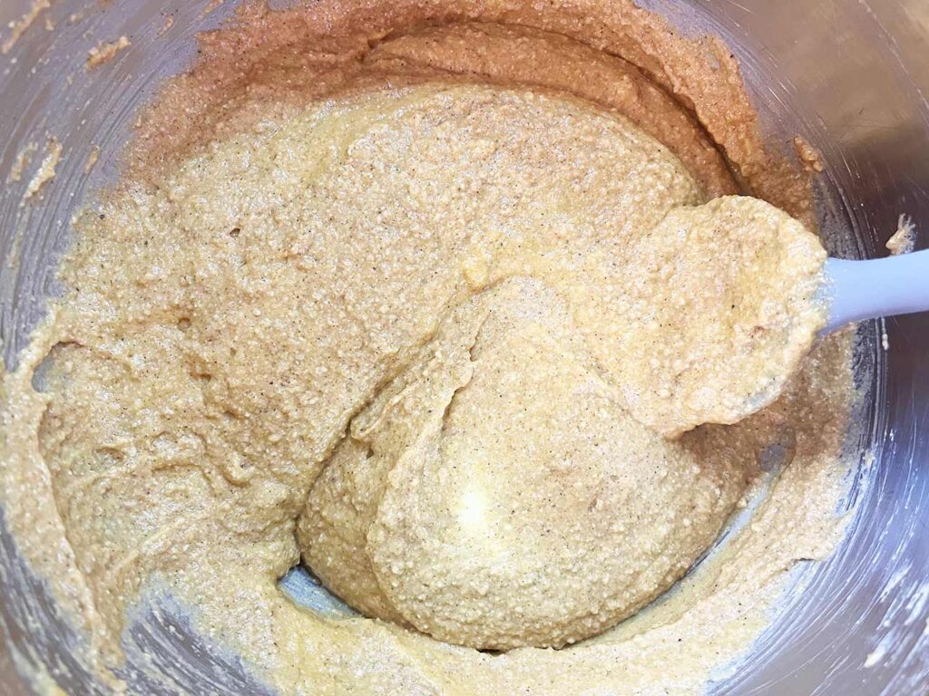 Mixed pumpkin bar batter, mixed together in a mixing bowl.