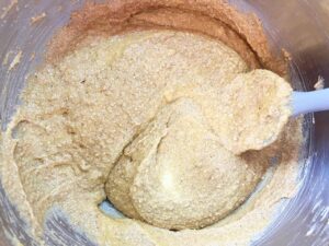 Mixed pumpkin bar batter, mixed together in a mixing bowl.