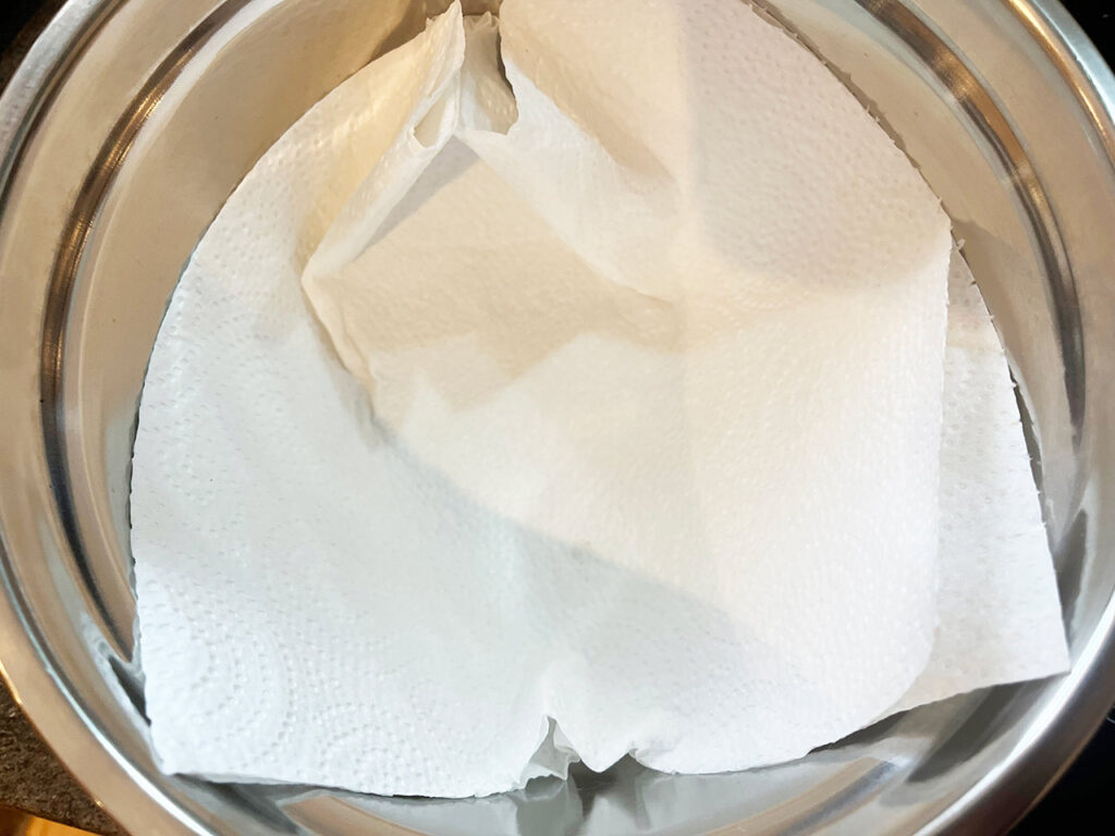 Paper towels lining a bowl.