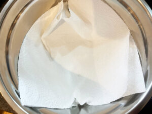 Paper towels lining a bowl.