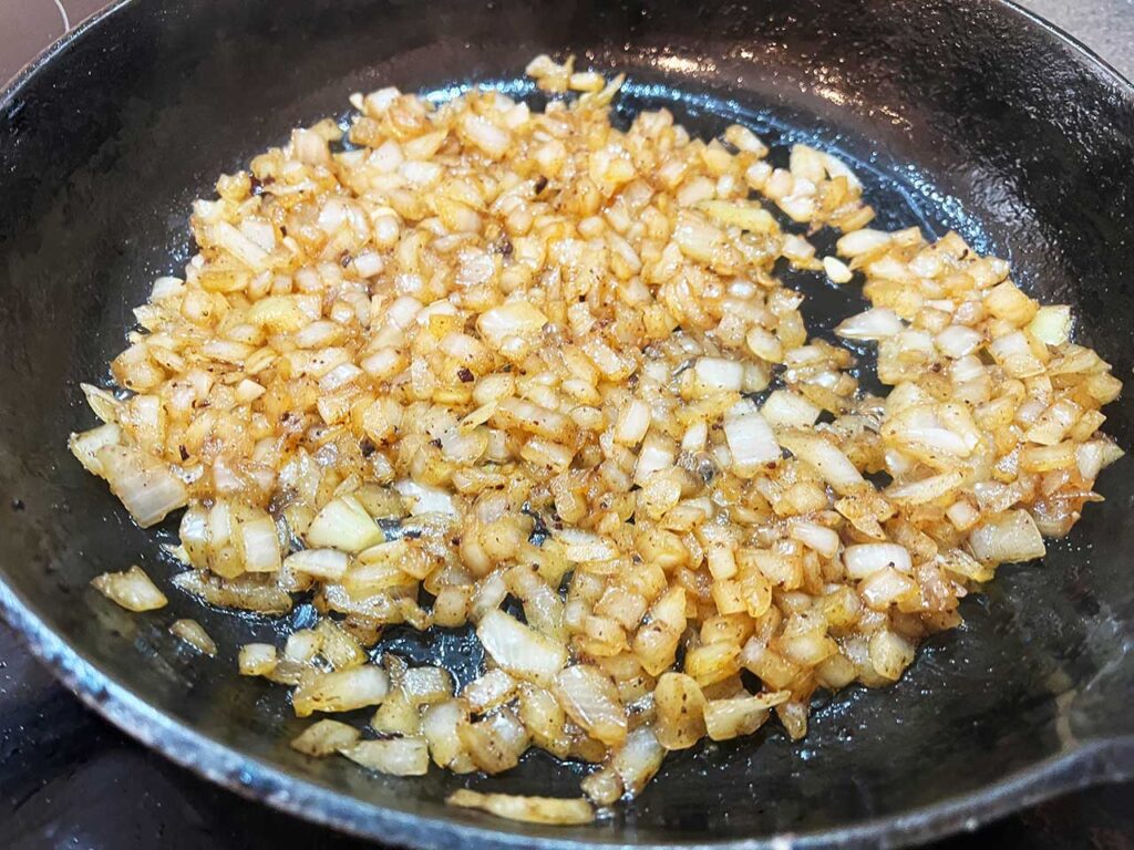 Sautéd onions in a skillet.
