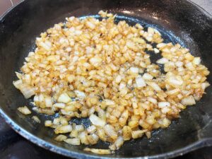 Sautéd onions in a skillet.