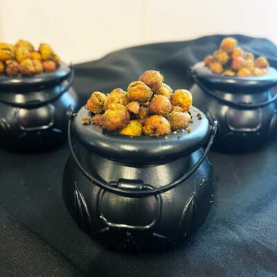 Front focus. Three mini cauldrons filled with Poisoned Brew Bubbles.