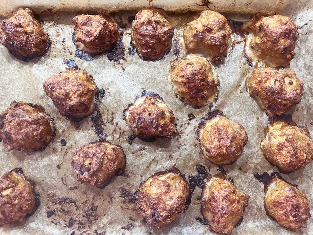 Overhead focus. A pan of just-baked Smokey Pumpkin Turkey Meatballs.