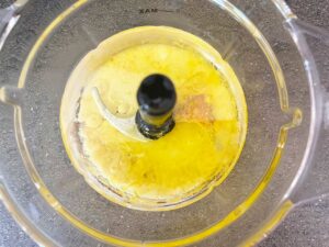 All the vegan butter ingredients added to a food processor.
