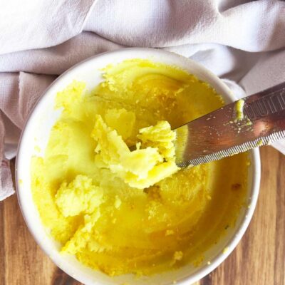 Mixed butter in a white ramekin.