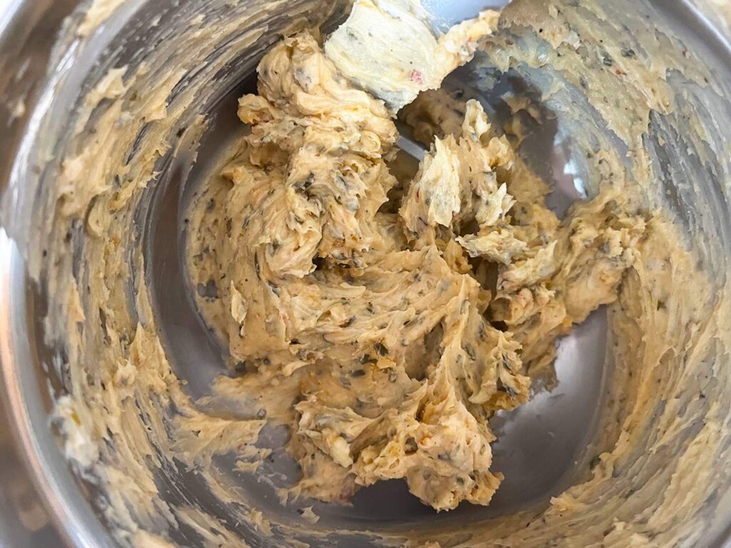 Cowboy compound butter mixed in a mixing bowl.