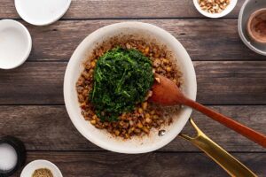 Frozen spinach added to the ground turkey.