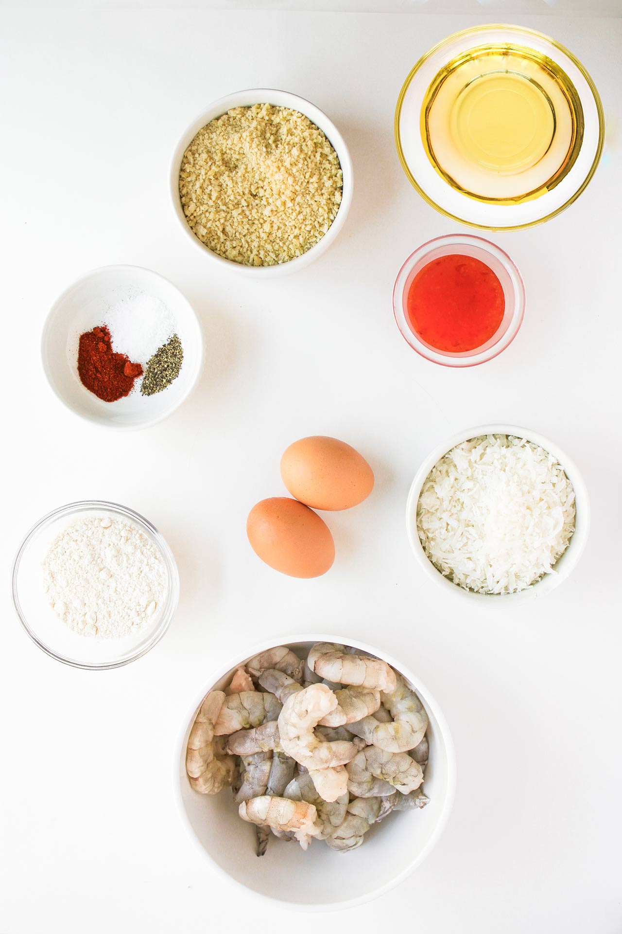 Crispy Coconut Shrimp ingredients in separate bowls.