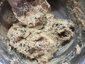 Oat Flour Chocolate Chip Cookie dough mixed together in a mixing bowl.