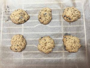 Oat Flour Chocolate Chip Cookies cooling on a cooling rack.