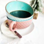 Spiced Coffee in a mug, which is stacked in another mug on top of two saucers.