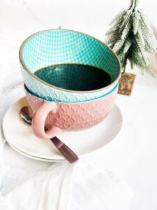 Spiced Coffee in a mug, which is stacked in another mug on top of two saucers.