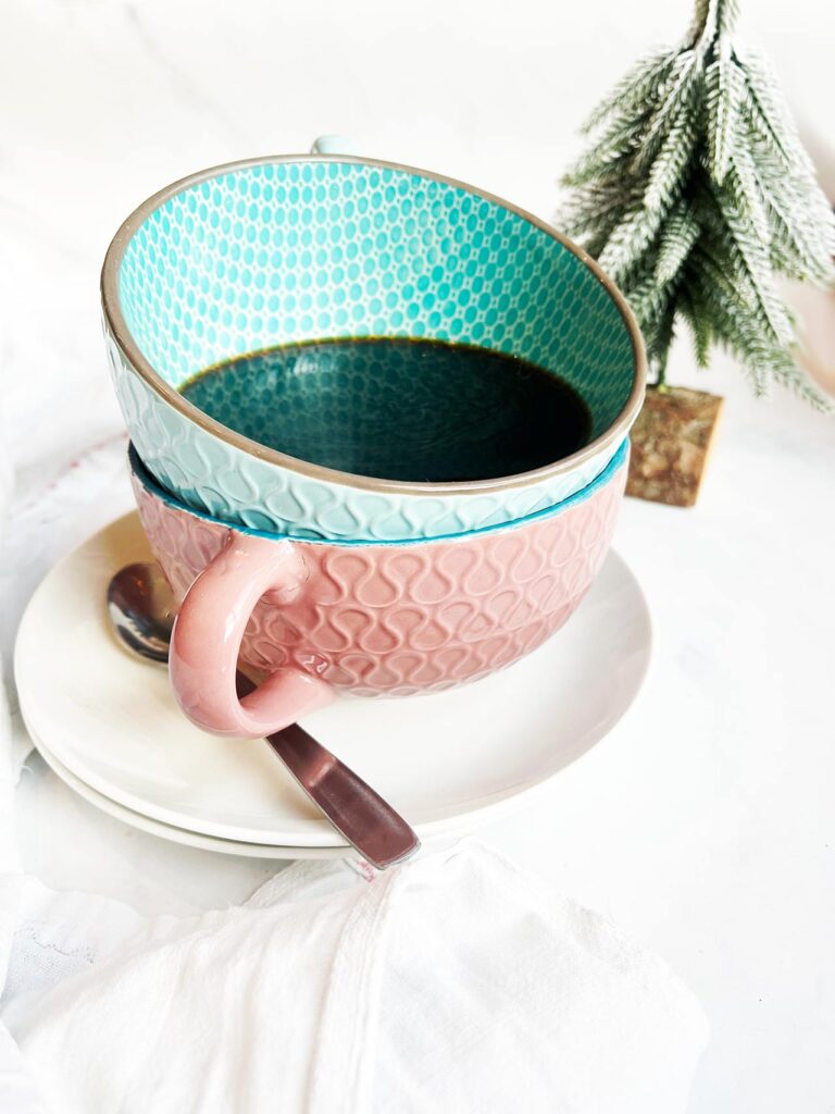 Spiced Coffee in a mug, which is stacked in another mug on top of two saucers.