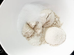 Dry snickerdoodle ingredients in a mixing bowl.