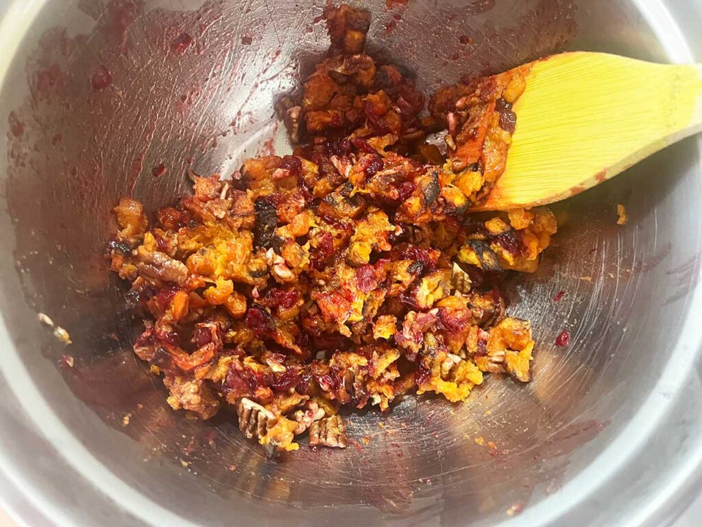 Sweet Potato Cranberry Salad mixed in a mixing bowl.