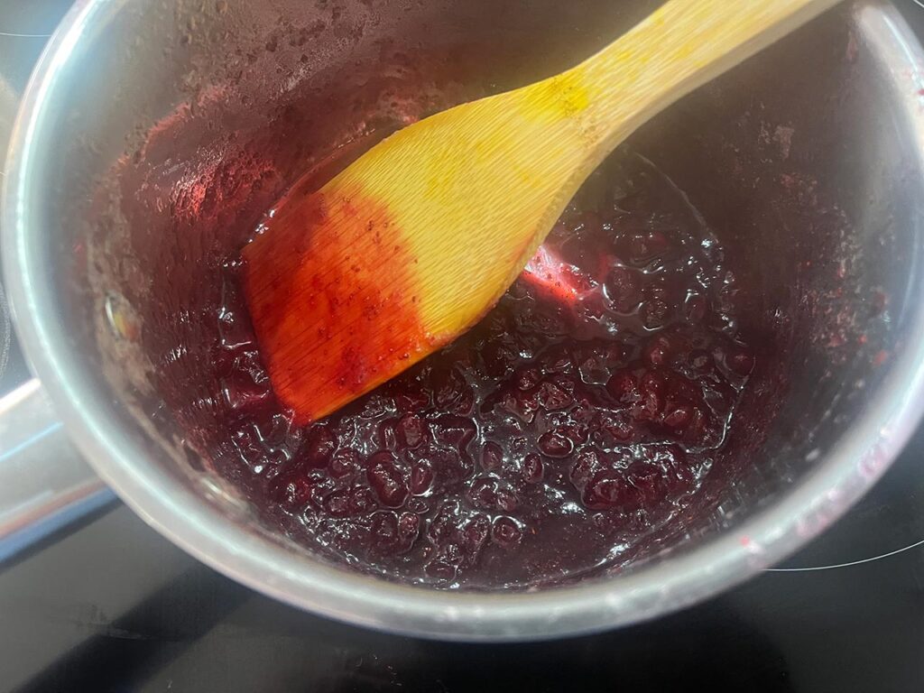 The finished cranberry sauce in a pot.