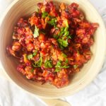 Sweet Potato Cranberry Salad in a wood bowl. Overhead focus.