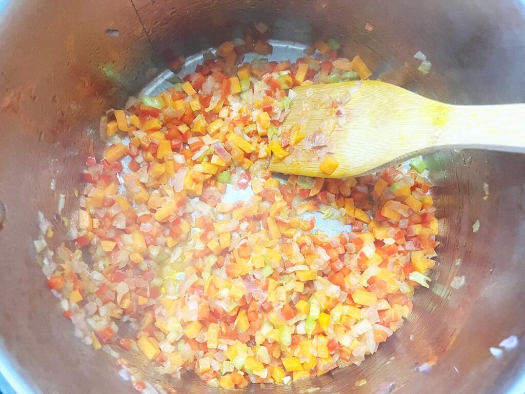 Cooked veggies in a pot.
