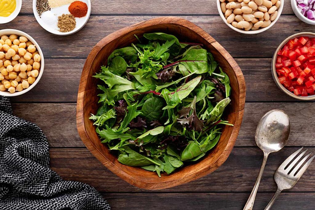 Lettuce in a wood bowl.
