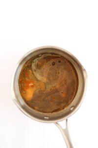 Sauce ingredients combined in a pot.