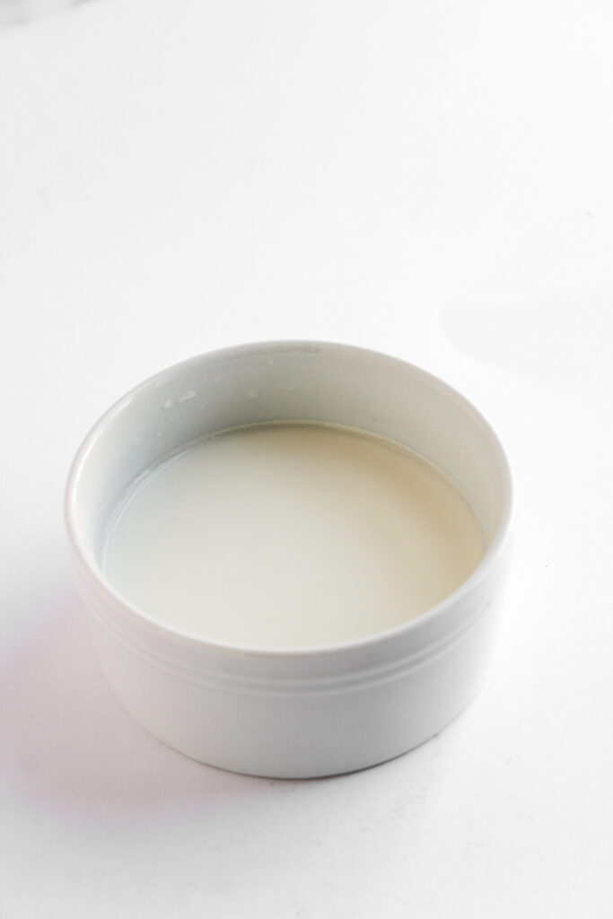 Starch slurry in a white bowl.