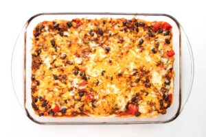 Beef Enchilada Casserole with cheese melted over the top.